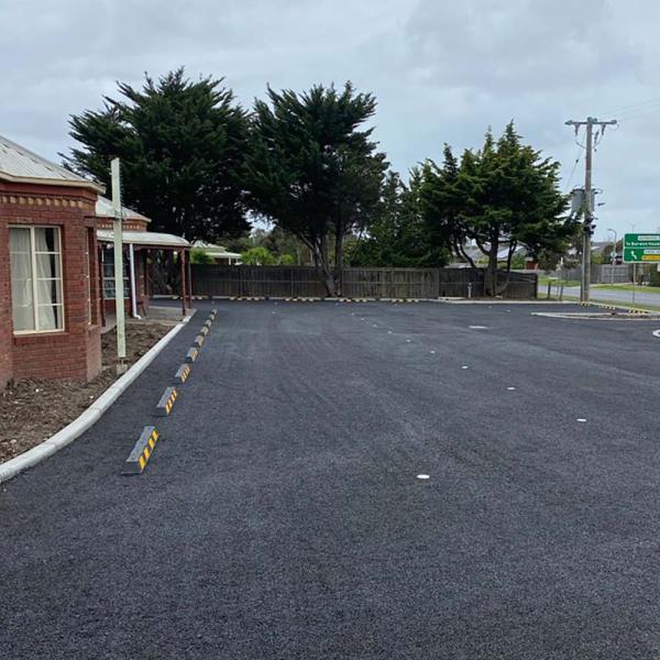Bitumen car park and concrete edging for church in Geelong