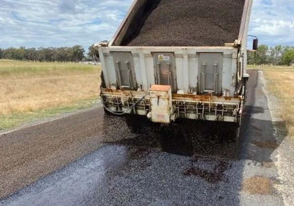 Truck laying bitumen at the Nagambie Airport for runway repairs