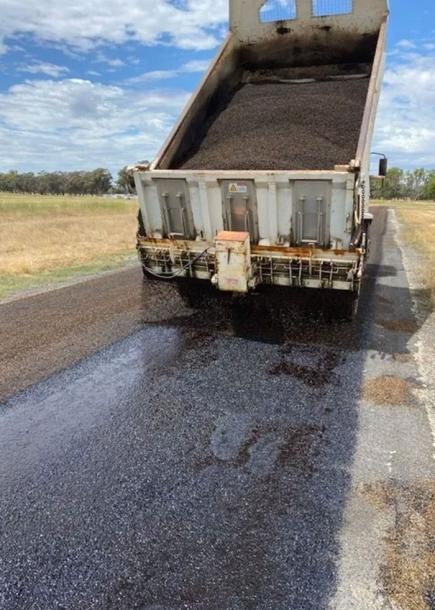 Truck laying bitumen at the Nagambie Airport for runway repairs